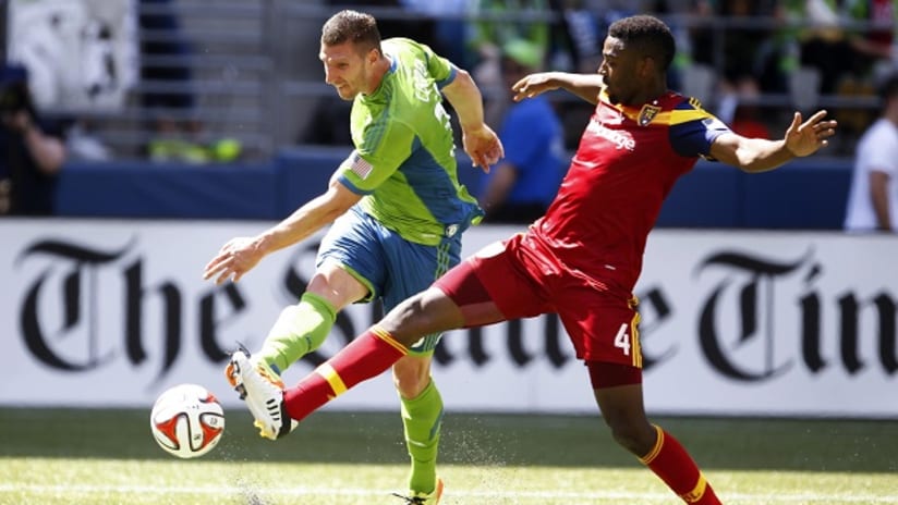 Real Salt Lake's Aaron Maund defends Seattle Sounders Kenny Cooper