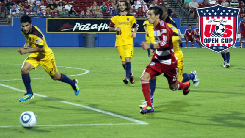 FC Dallas' Eric Avila speeds by RSL defenders in a USOC match.