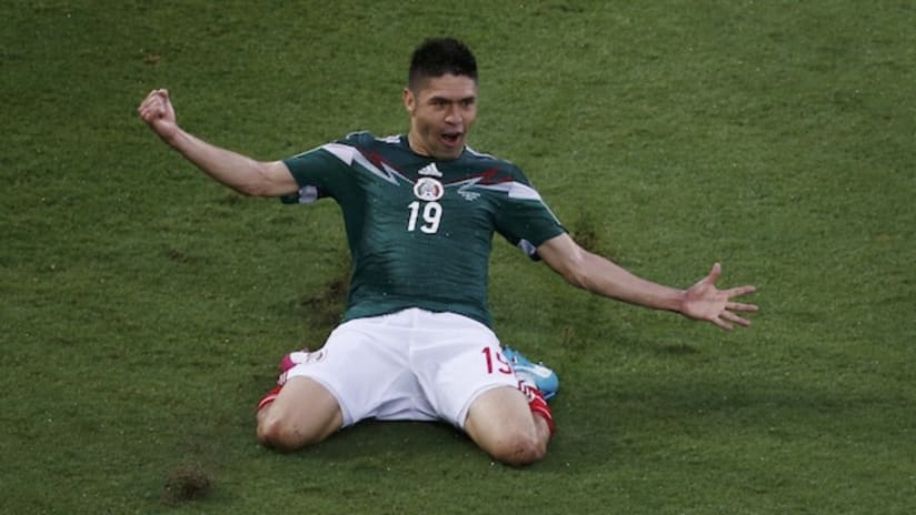 Mexico's Oribe Peralta celebrates his goal vs. Cameroon in the World Cup