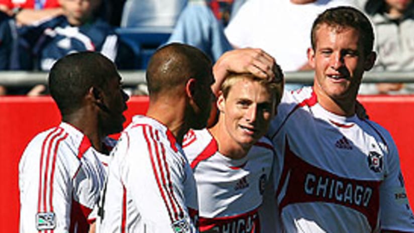 Chris Rolfe (center) scored the game-winner for the Fire Sunday afternoon.