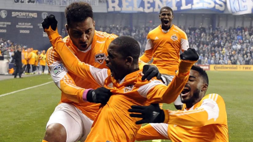 Boniek Garcia and Houston Dynamo players celebrate Saturday night vs. Sporting Kansas City