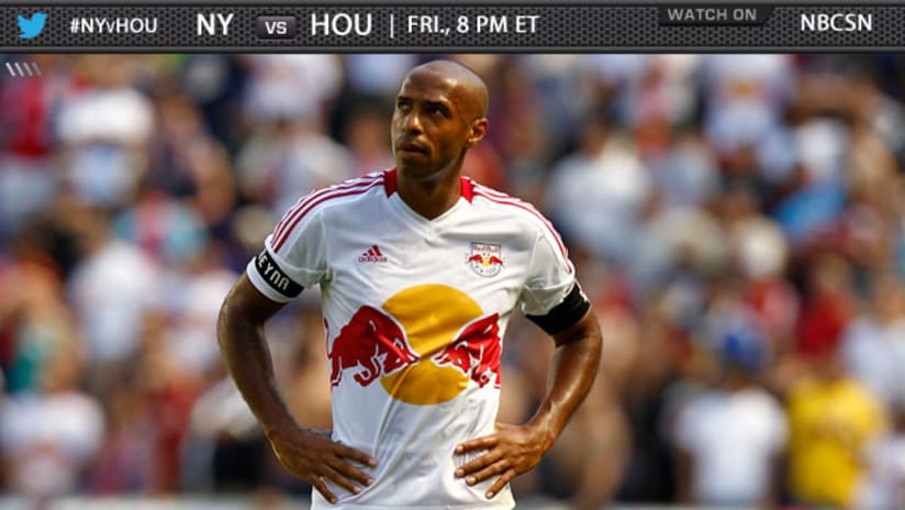 Thierry Henry looks at a bird or something