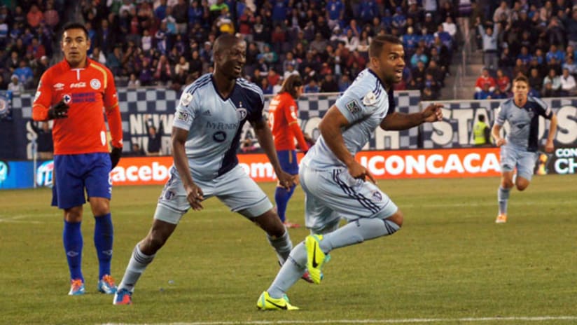 Sporting KC's Kevin Ellis and Ike Opara celebrate vs. Cruz Azul