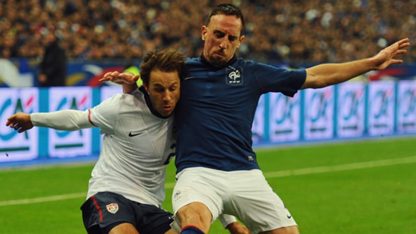The US' Steve Cherundolo (left) battles France's Franck Ribery on Friday.
