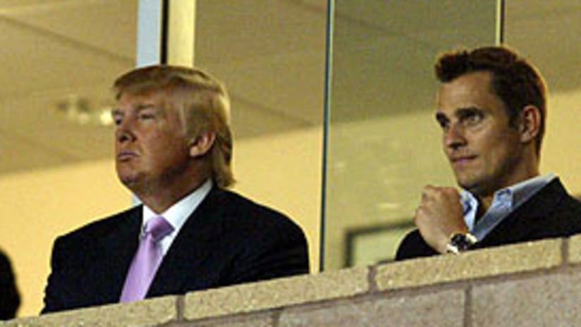 Donald Trump (left) and Bill Rancic take in a Galaxy game.