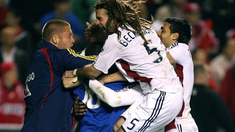 Real Salt Lake players celebrate after beating the Chicago Fire in the Eastern Conference Championship in 2009.