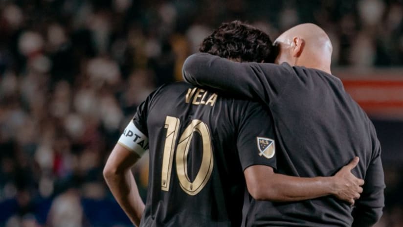 Carlos Vela, Bob Bradley - LAFC - hug, rear view