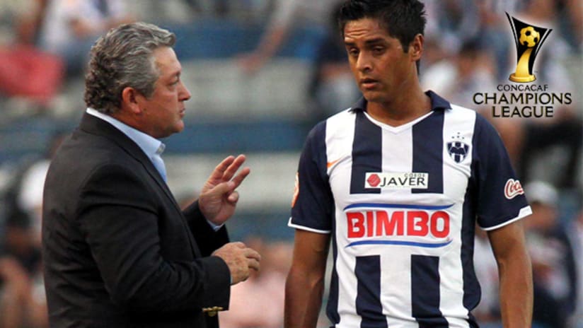 Monterrey coach Victor Manuel Vucetich (left) has some words with forward Sergio Santana.