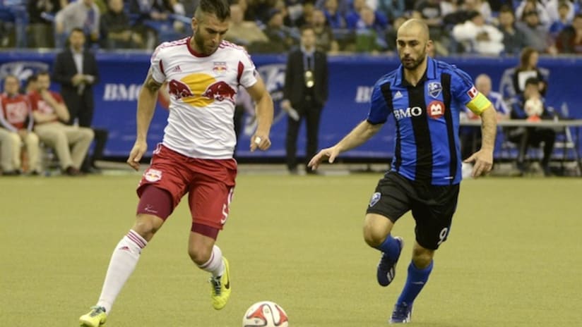 New York Red Bulls' Armando defends against the Montreal Impact's Marco Di Vaio