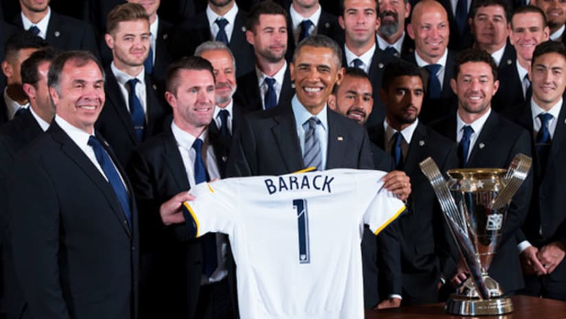 Barack Obama poses with an LA Galaxy jersey on February 2, 2015