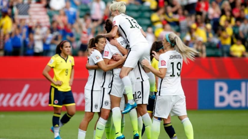 The USWNT celebrate a goal against Colombia, 2015 Women's World Cup