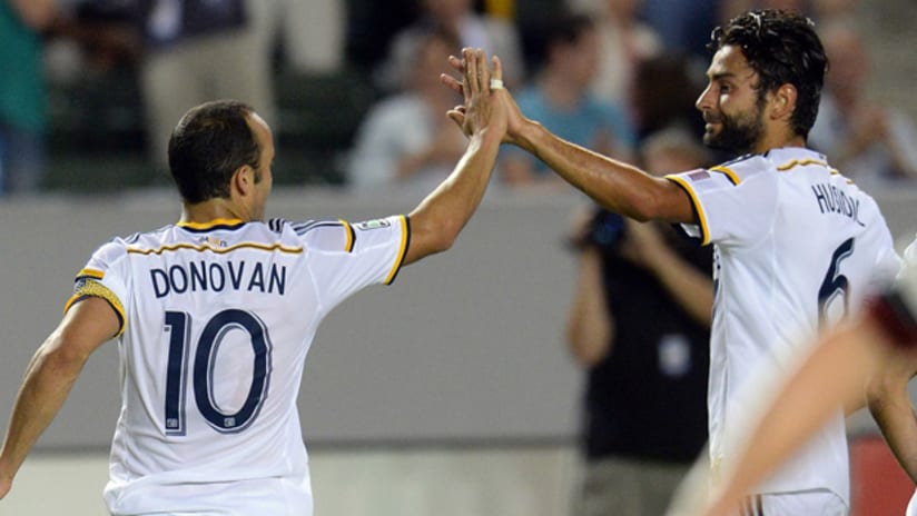 Landon Donovan and Baggio Husidic (LA Galaxy) celebrate a goal vs. DC United