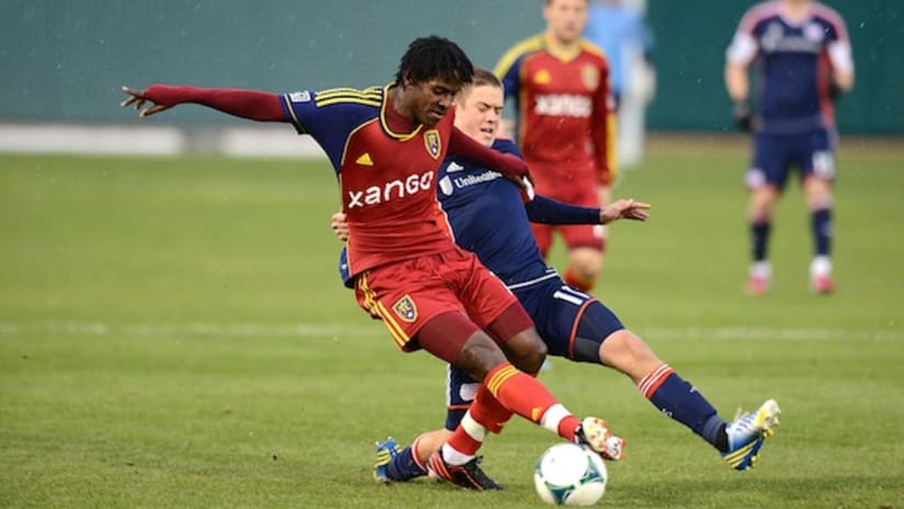 RSL's Lovel Palmer and New England's Kelyn Rowe in the Desert Diamond Cup