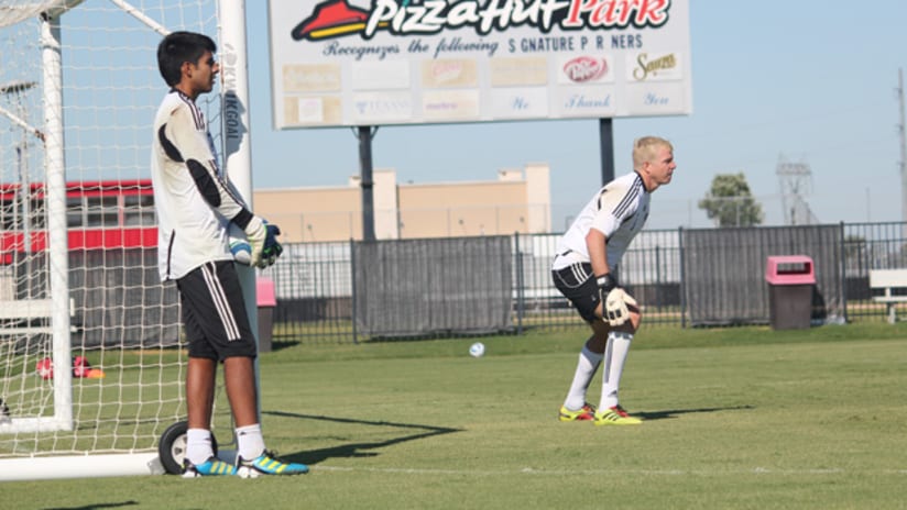 FC Dallas youngster Richard Sanchez (left) shadows Kevin Hartman during a recent workout at Pizza Hut Park.