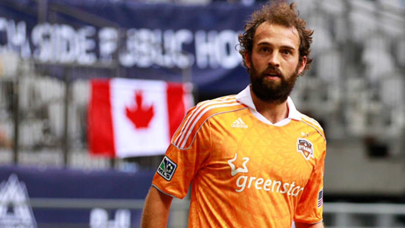 Adam Moffat with beard and Canadian flag