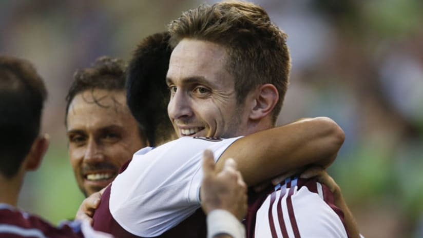 Kevin Doyle celebrated by his teammates (July 18, 2015)