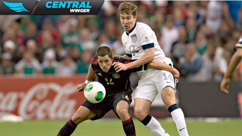 Central Winger - Chicharito and Besler grapple during Mex-USA