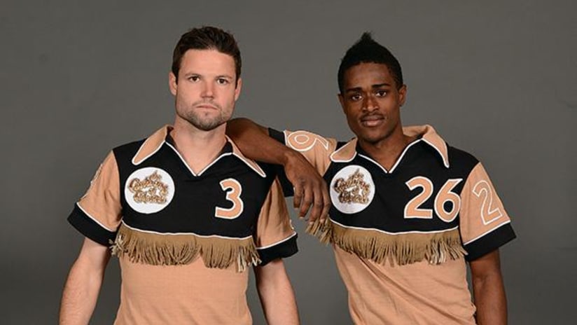 Colorado Rapids players Drew Moor and Deshorn Brown wearing Caribous throwback jerseys