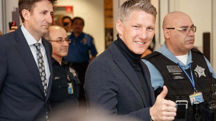 Bastian Schweinsteiger thumbs up on airport arrival - March 28, 2017