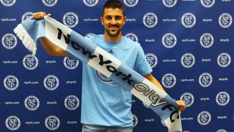 David Villa holds NYCFC scarf.