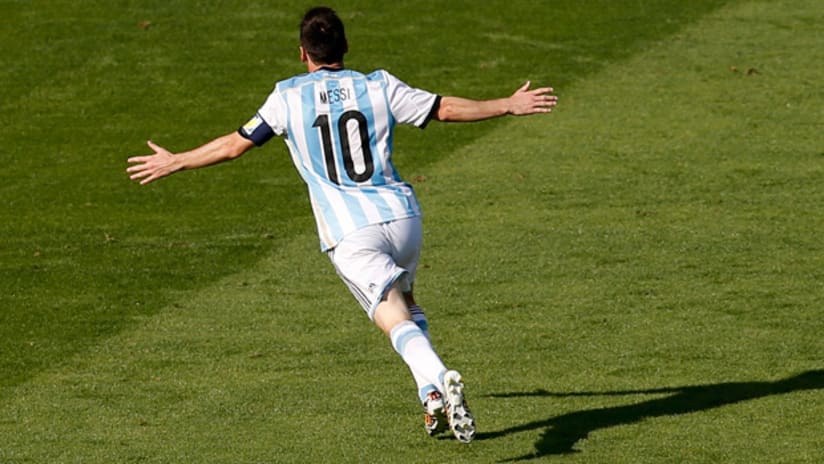 Lionel Messi celebrates his goal vs. Iran