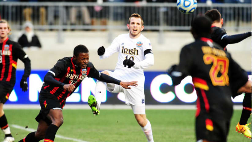 Maryland's Sull Dainkeh leaps in front of Notre Dame's Harrison Shipp, NCAA College Cup, December 15, 2013.
