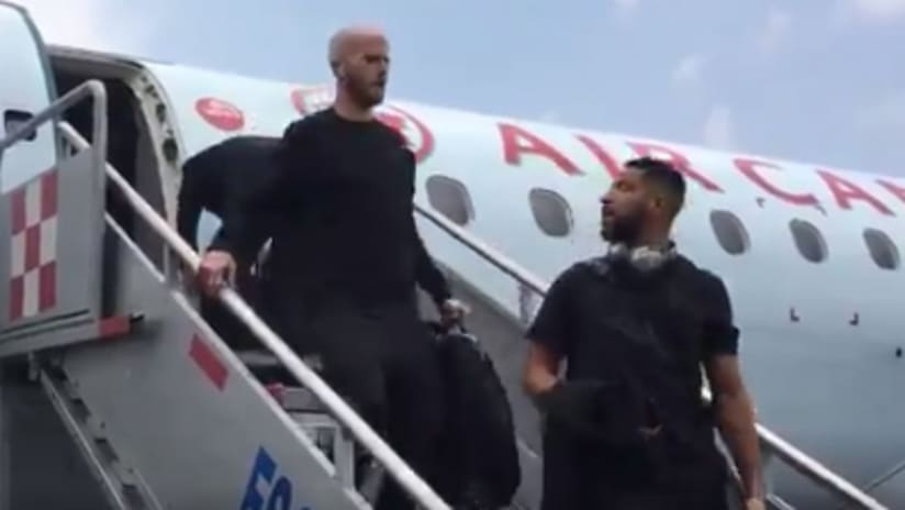 Michael Bradley and Justin Morrow descend from airplane in Mexico - April 5, 2018
