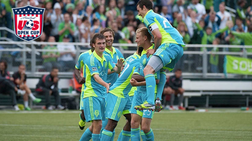 The Sounders celebrate Andy Rose's goal - USOC