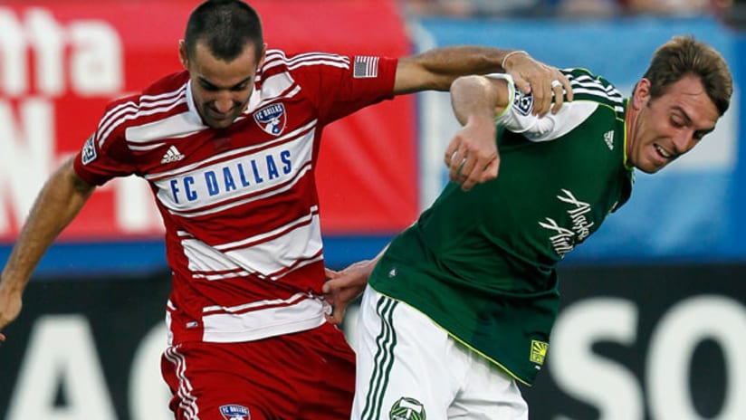 FC Dallas' Andrew Jacobson and Portland's Eric Alexander, July 21, 2012.
