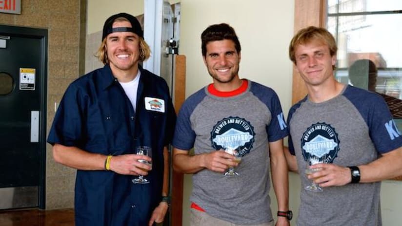 SportingKC's Chance Myers, Sal Zizzo and Seth Sinovic with commemorative Championship Ale beer