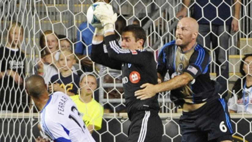 Conor Casey goes up for ball vs. Troy Perkins (August 31, 2013)