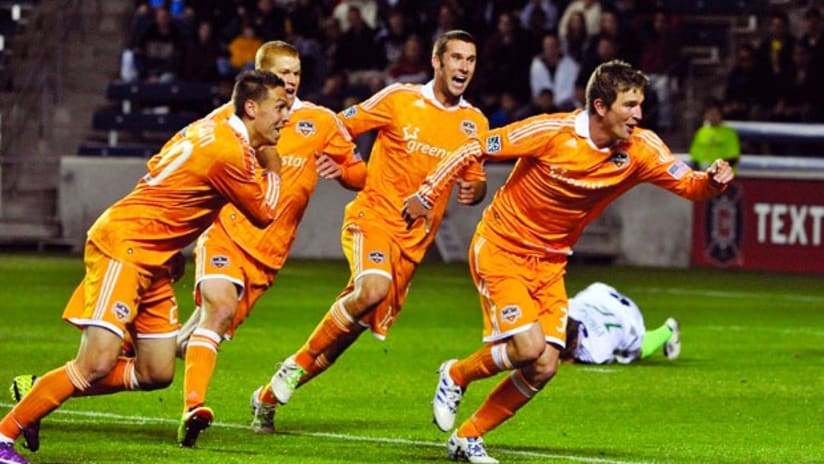 The Houston Dynamo celebrate Bobby Boswell's equalizer in Chicago.