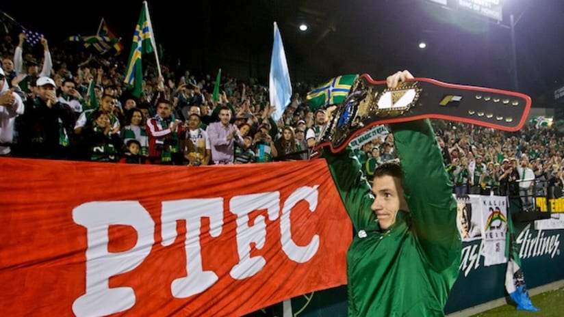 Will Johnson celebrates Portland's playoff berth in front of the Timbers Army