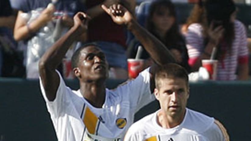 Edson Buddle (L) celebrates his goal against Real Salt Lake with Kyle Martino.