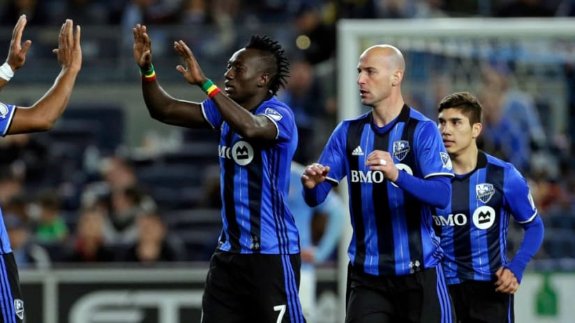 Didier Drogba and Dominic Oduro (Montreal Impact) celebrate a goal