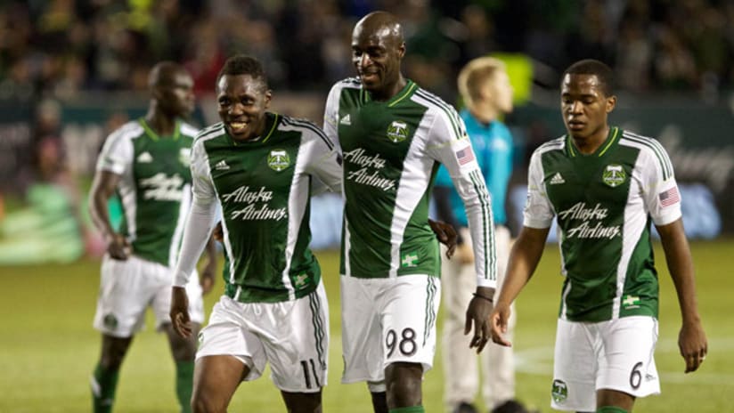 Portland's Kalif Alhassan celebrates his goal with Darlington Nagbe and Futty Danso