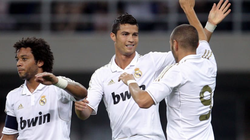 Real Madrid's Marcelo (left), Cristiano Ronaldo (center) and Karim Benzema celebrate a goal.