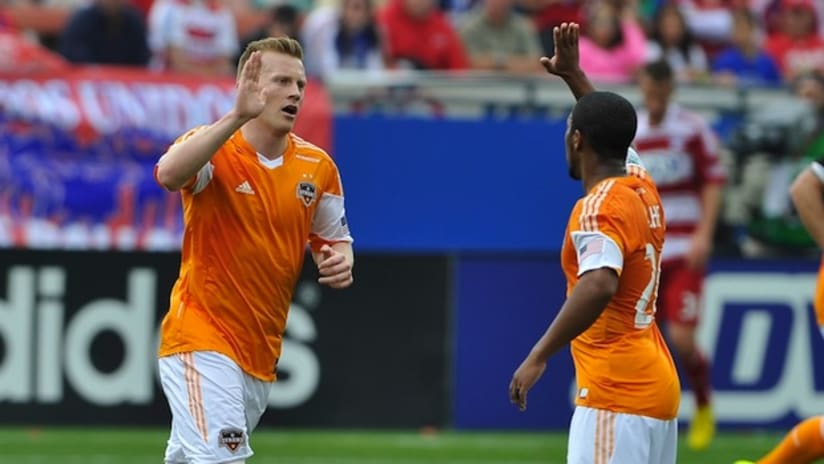 Andrew Driver celebrates his first goal for Houston