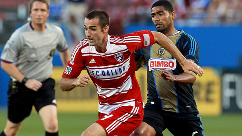 Dallas midfielder Andrew Jacobson (left) is chased by Philly midfielder Gabriel Gomez