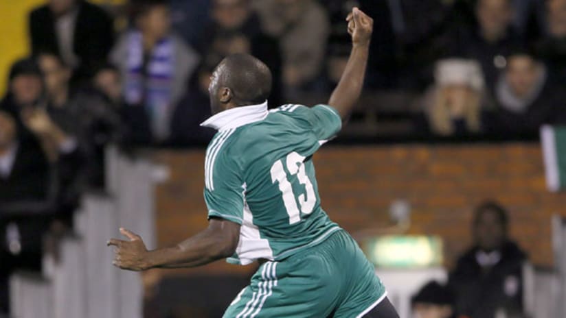 Bright Dike celebrates his goal for Nigeria vs. Italy