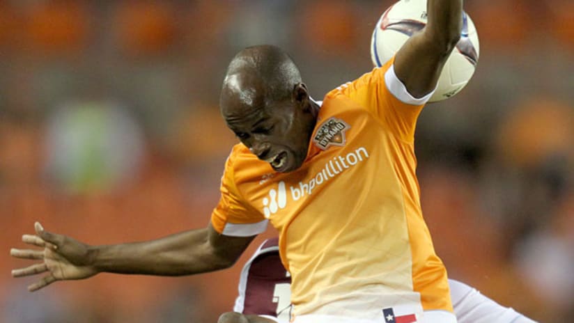 Houston Dynamo defender DaMarcus Beasley goes up for an aerial