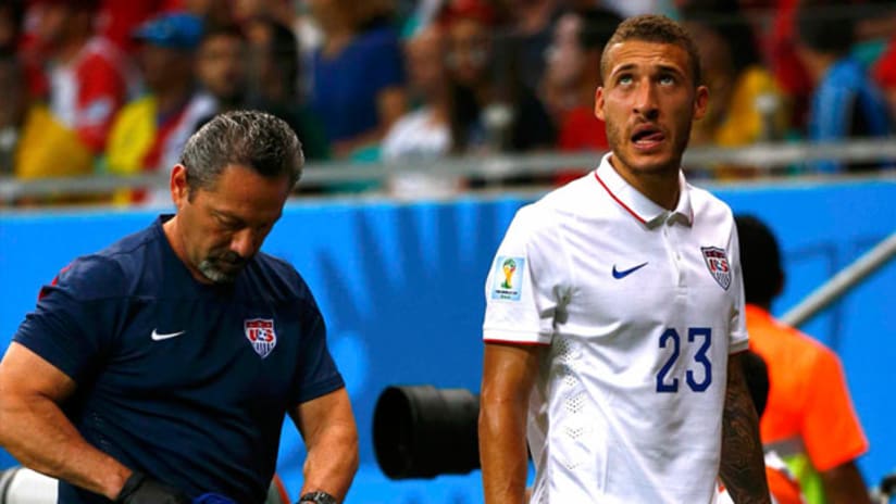Fabian Johnson with a USMNT trainer