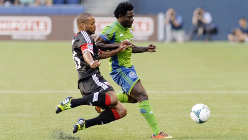 Seattle's Obafemi Martins and DC United's Ethan White