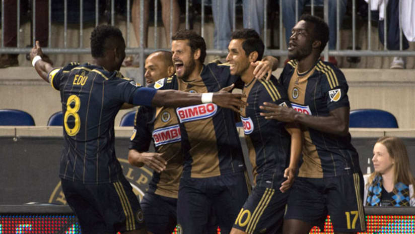 Philadelphia Union midfielder Tranquillo Barnetta celebrates with teammates after a goal