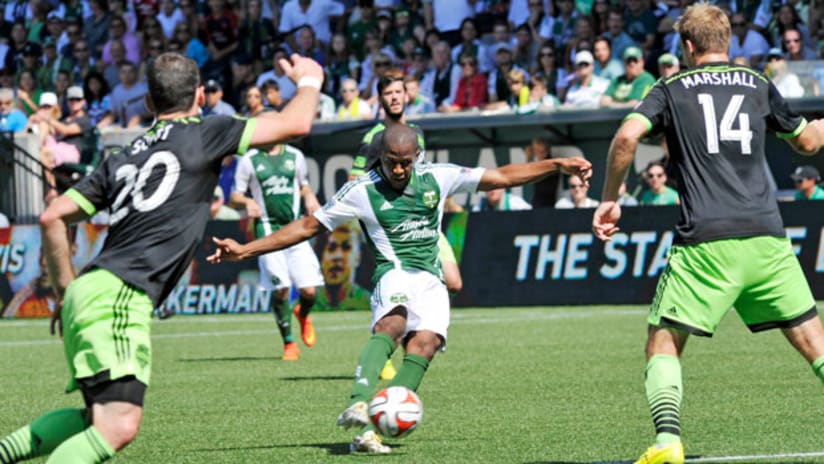 Darlington Nagbe, Portland Timbers, takes a shot against Seattle