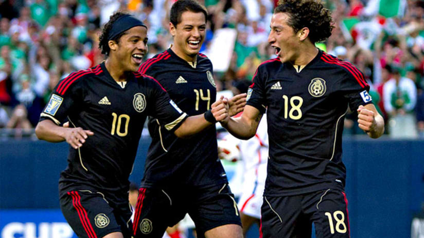 Mexico's Andres Guardado (right) celebrates a goal with teammates Giovani dos Santos (left) and Javier Hernandez.