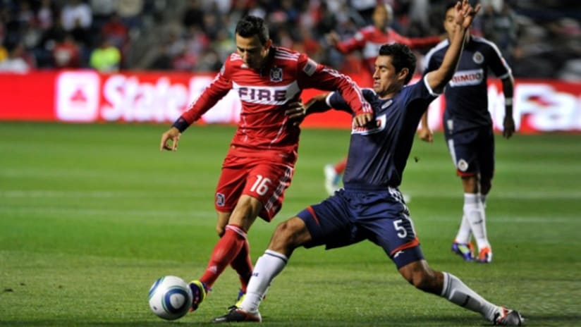 Marco Pappa (left) and the Chicago Fire came away with a 1-0 loss to Chivas de Guadalajara on Wednesday night.