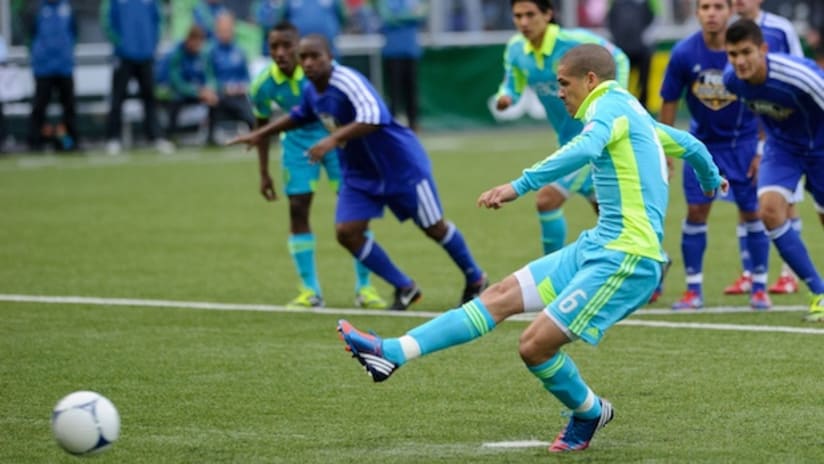 Osvaldo Alonso takes a penalty kick against Cal FC at Starfire Stadium