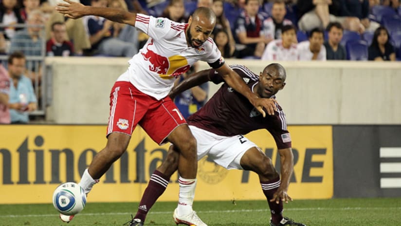 Thierry Henry and Marvell Wynne do battle in New York's 2-2 draw with Colorado