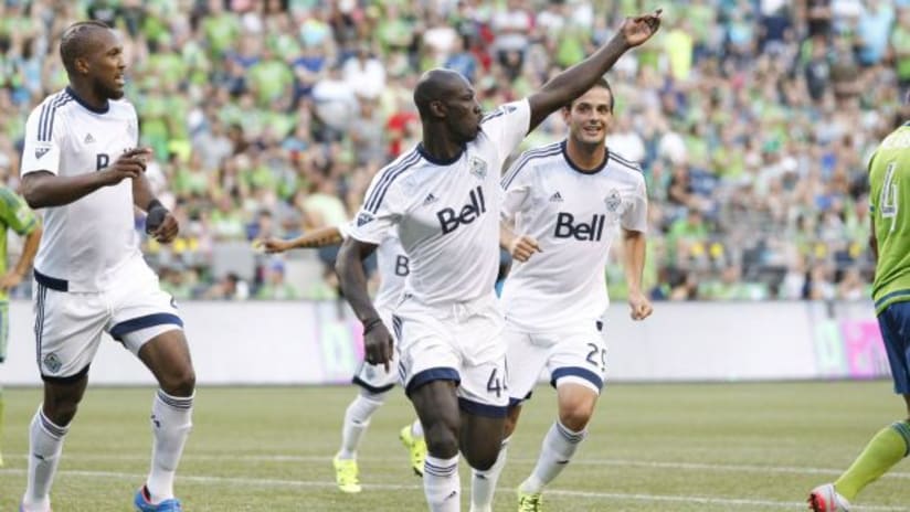 Vancouver Whitecaps defender Pa-Modou Kah celebrates after scoring a goal against the Seattle Sounders FC